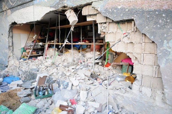 This shop was hit by a rocket during Operation Defense Column. (Photo: IDF)